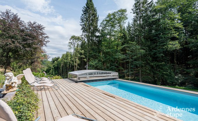 Charmant vakantiehuis in Manhay voor 8 personen, met verwarmd buitenzwembad, privvijver en fietsgarage aan de rand van het bos